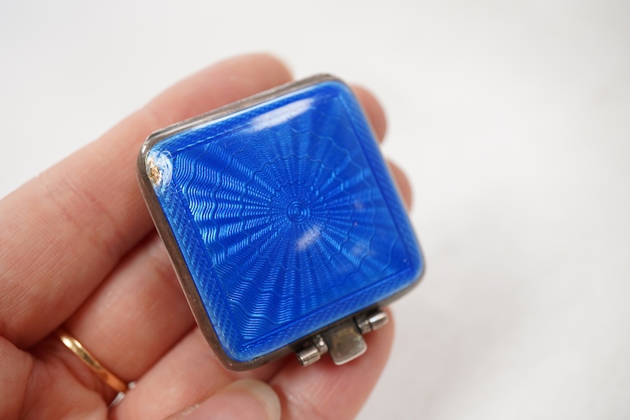 A George V silver and blue guilloche enamel travelling folding timepiece, maker SSM, Birmingham, 1931, with Arabic dial and subsidiary seconds, case diameter 37mm, enamel a.f.